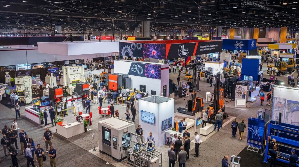 Manufacturing professionals networking during FABTECH event